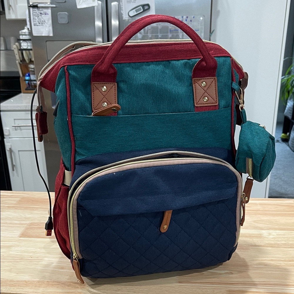 Colorful diaper bag! Turns into bassinet!